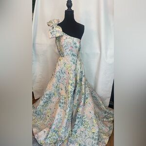 Mac Duggal Multicolor One Shoulder Brocade Floral Gown With Bow